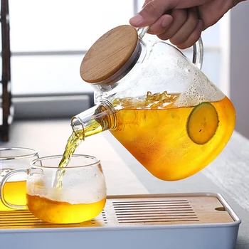 Bambusz csomagolt acél fedelű vízforraló - átlátszó üveg citromlé háztartási hideg főtt szezonális  Kép
